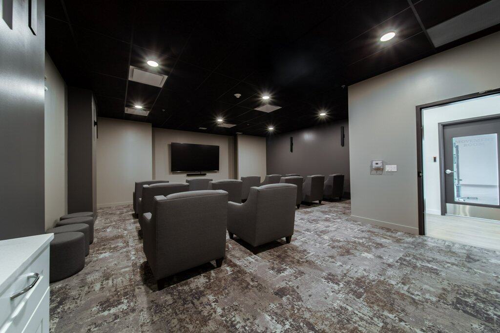 Theatre Room in Three Robins Riverside, independent senior living in St. Albert