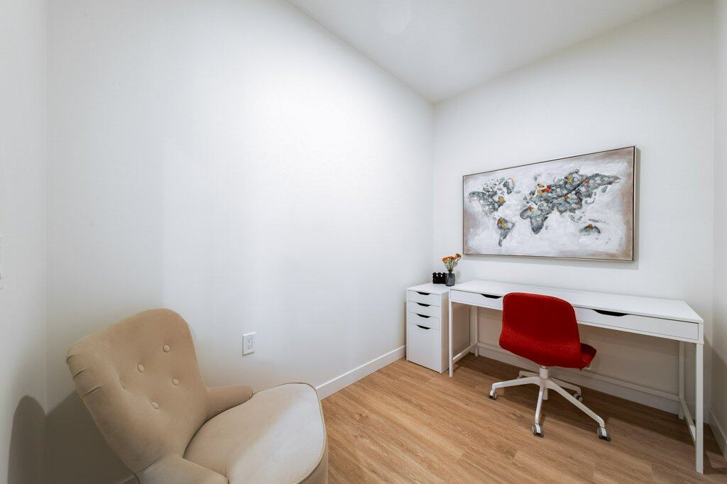 Den or Office of a two bed + den suite at Three Robins Riverside, independent senior living in St. Albert