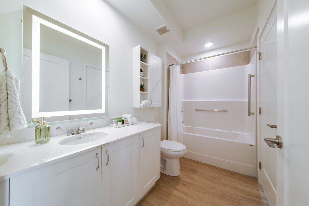 Accessible bathroom in a suite at Three Robins Riverside, independent senior living in St. Albert