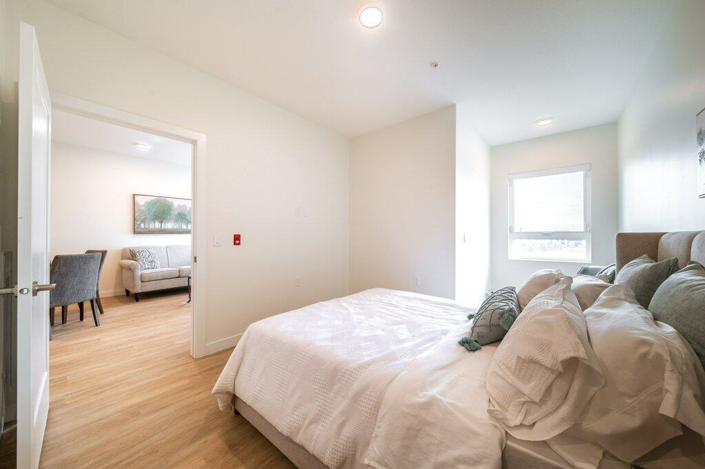 Suite 209 - Primary Bedroom in a two-bedroom suite, Three Robins Riverside