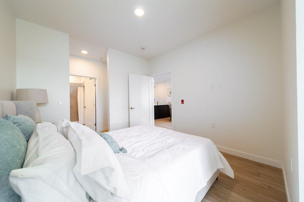 Suite 209 - Primary Bedroom in a two-bedroom suite, Three Robins Riverside