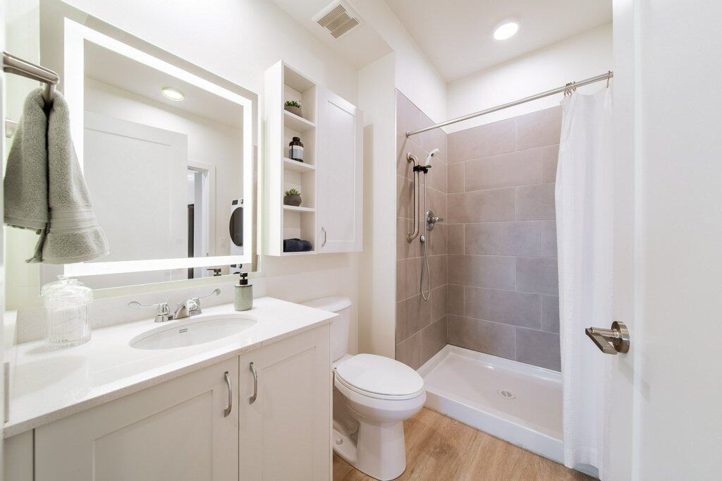 Accessible bathroom in a suite at Three Robins Riverside, independent senior living in St. Albert
