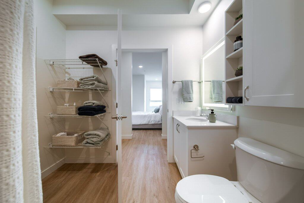 Accessible bathroom in a suite at Three Robins Riverside, independent senior living in St. Albert