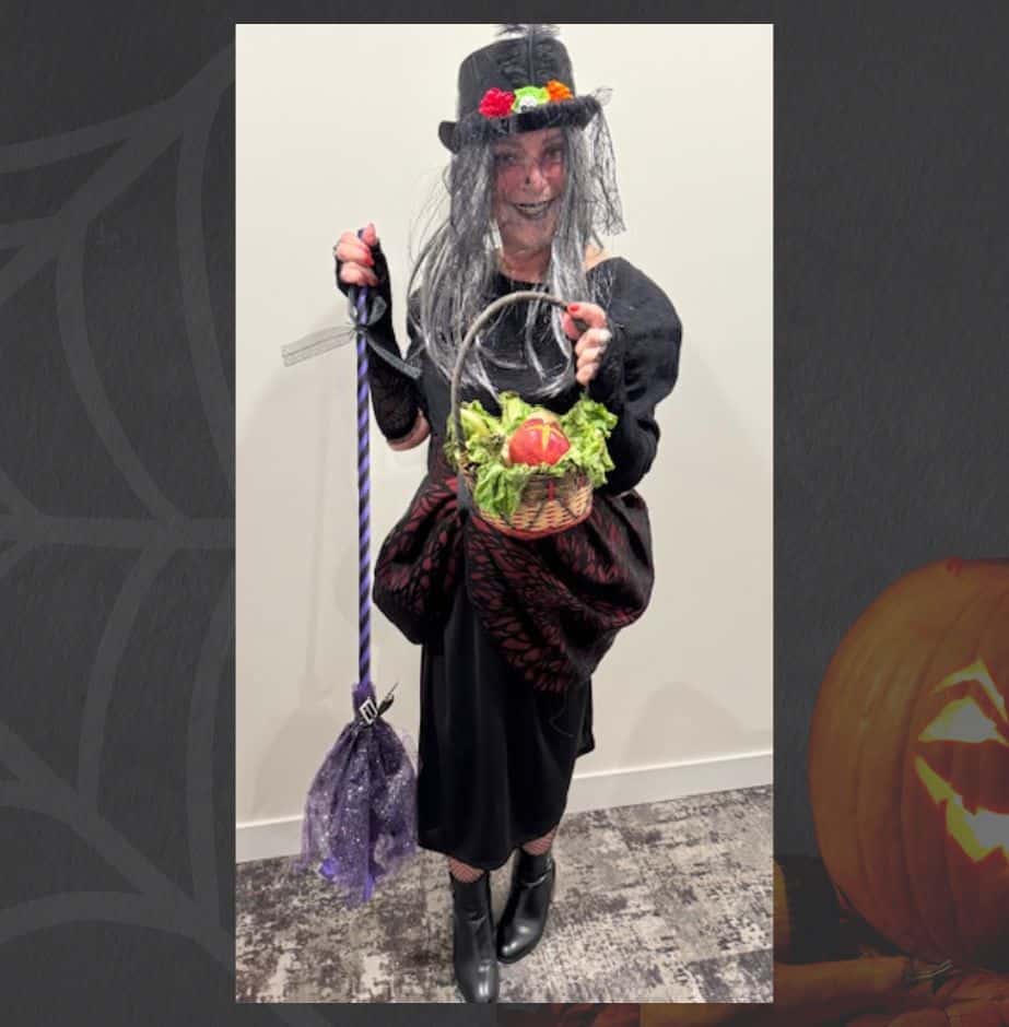 Three Robins Riverside resident dress up for halloween as a witch