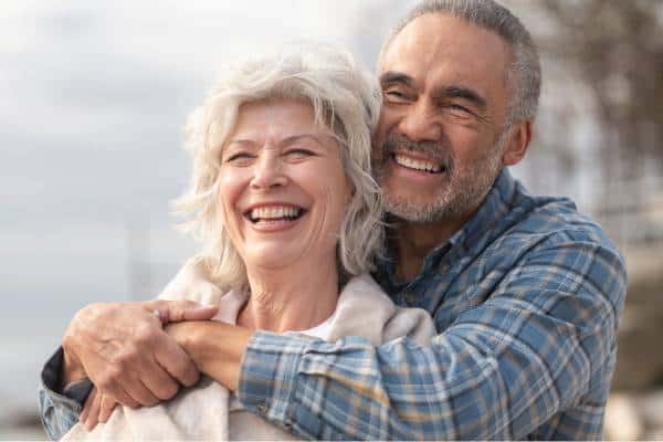 An older couple enjoying their decision to move to Three Robins Riverside apartments in St. Albert