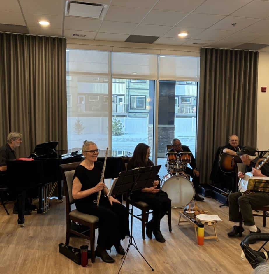 Musicians performing in a cozy setting.