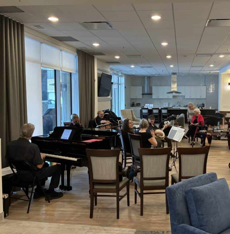 Residents enjoying live music performance.