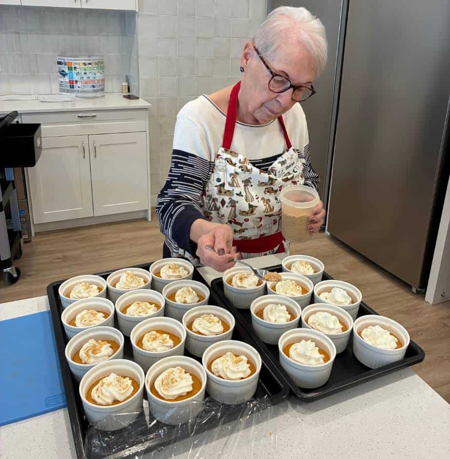 Preparing mini pies in kitchen