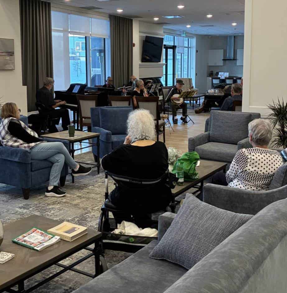 Musicians performing in a cozy lounge.